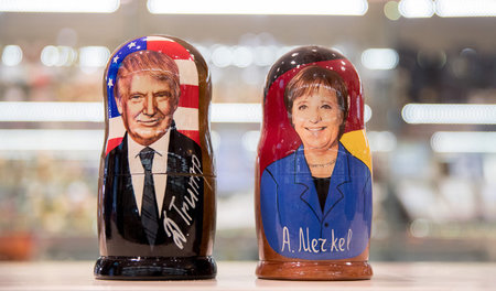Schwieriger Dreier: Trump- und Merkel-Martrioschka in Moskauer S...