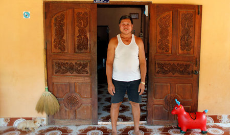 Kongkaew Vonusak, der sein Land an eine chinesische Bananenfirma...