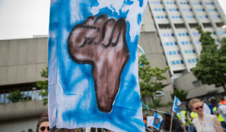 Als am 9. Juni in Berlin die »G-20-Afrika-Konferenz« tagte, vera...