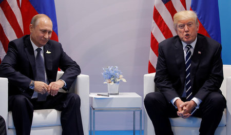 Wladimir Putin und Donald Trump während ihres Treffens in Hambur...