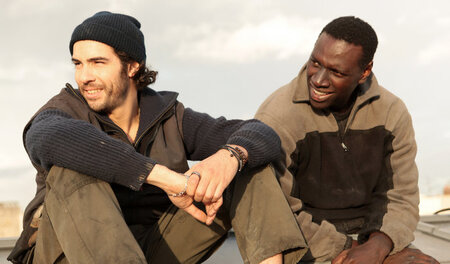 Samba (Omar Sy) aus dem Senegal und der „Brasilianer“ Wilson (Ta...