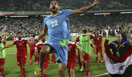 Syrien hat Hoffnung: Die Spieler feiern ihre historische WM-Chan... Syrien hat Hoffnung: Die Spieler feiern ihre historische WM-Chan...