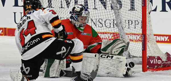 German women's ice hockey team celebrates a goal