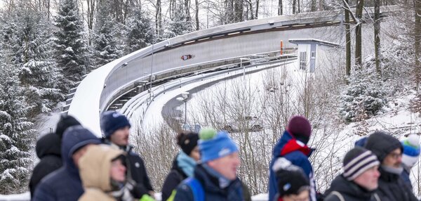 Tobogganing action on a bobsled track